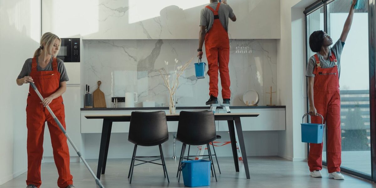 A professional cleaning crew maintaining a commercial space